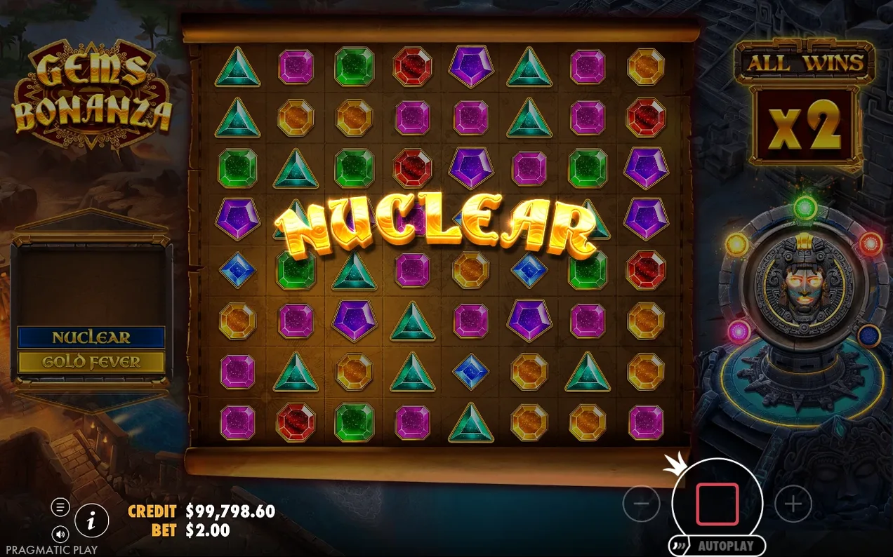 Grilă 8x8 cu geme colorate, text auriu NUCLEAR suprapus, panou ALL WINS x2 și jurnal Nuclear Gold Fever